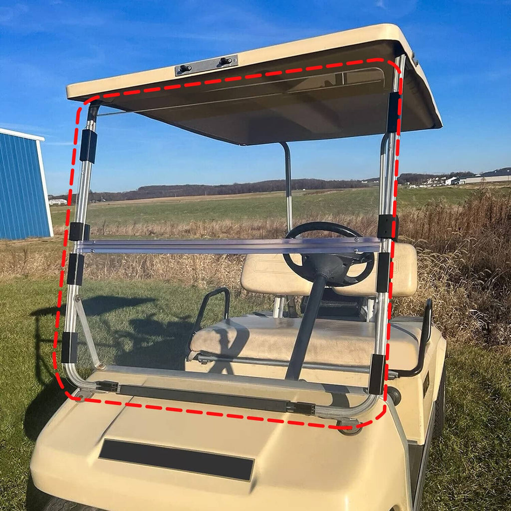 Clear folding golf cart windshield with black frame, installed on a beige cart
