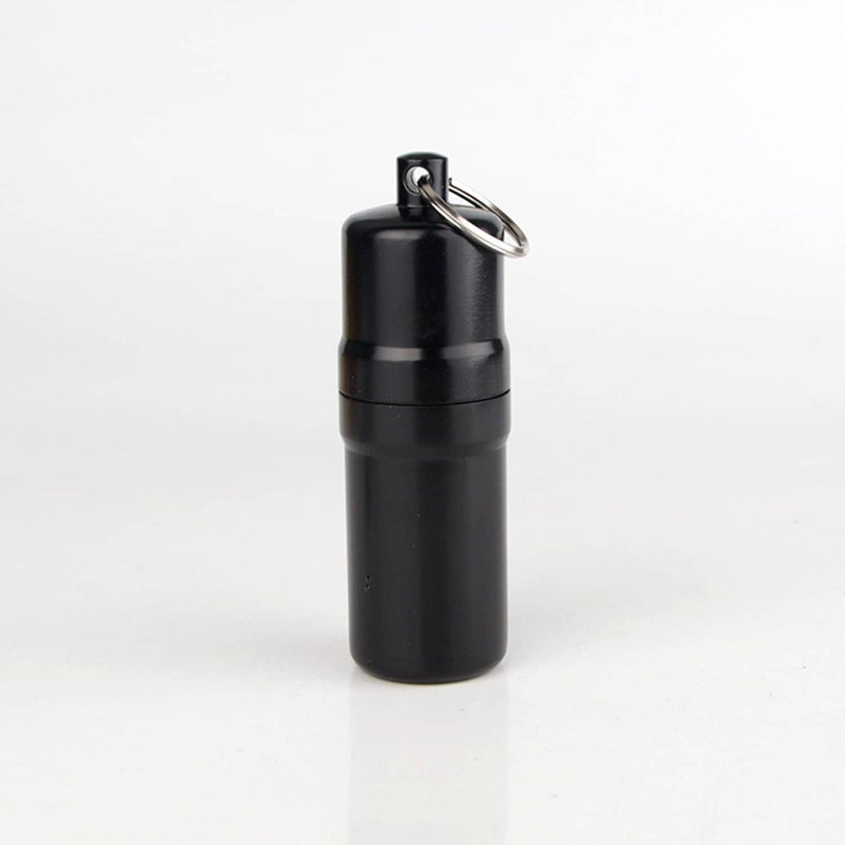 Small black round cigarette case with metal key ring and top latch