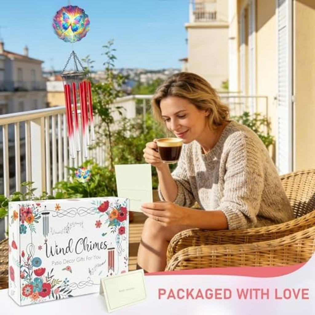 Outdoor butterfly wind chime with rainbow pendant and red tubes, with floral gift box