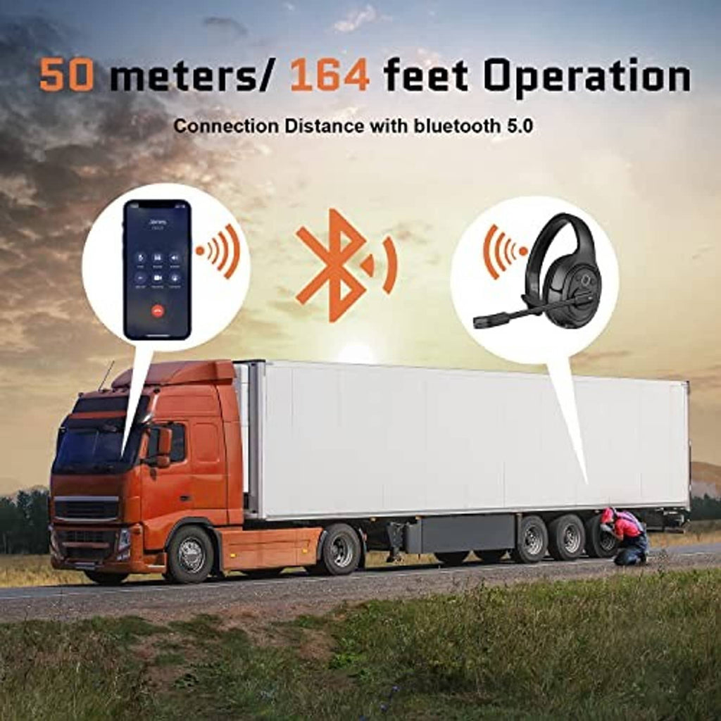 Over-ear black Bluetooth headset with boom mic shown with a truck on roadside