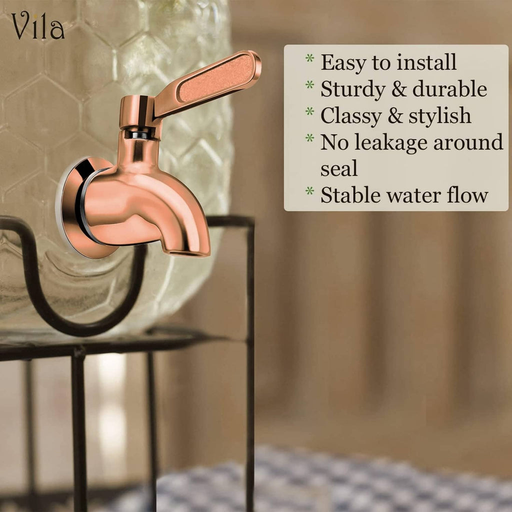 Beverage dispenser spigot faucet with copper handle and chrome spout on a dispenser