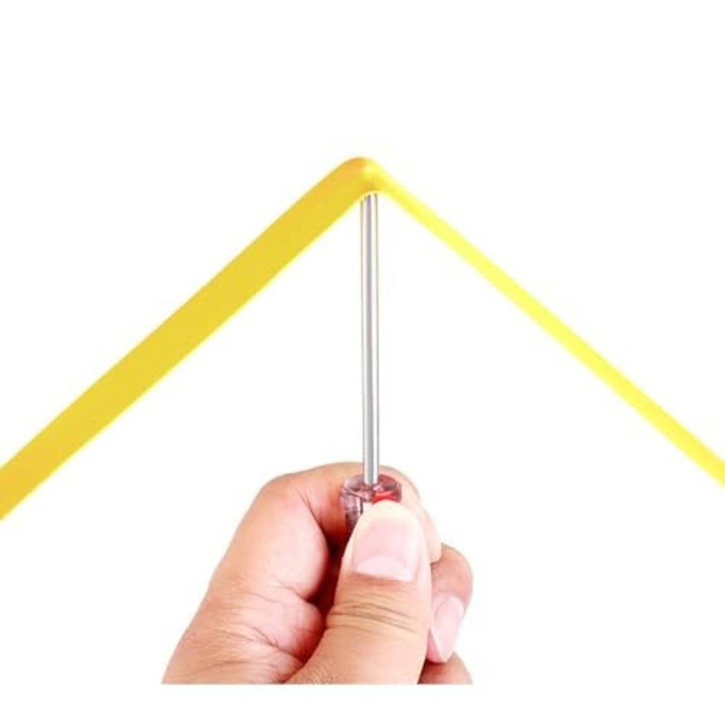 Hand holding an insertion tool beside yellow bicycle tire liner puncture tape