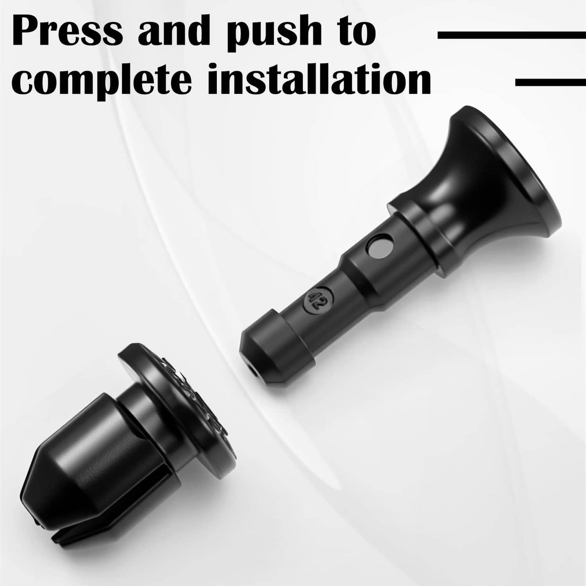 Black push lock pin with ribbed stem and wide head, base attached