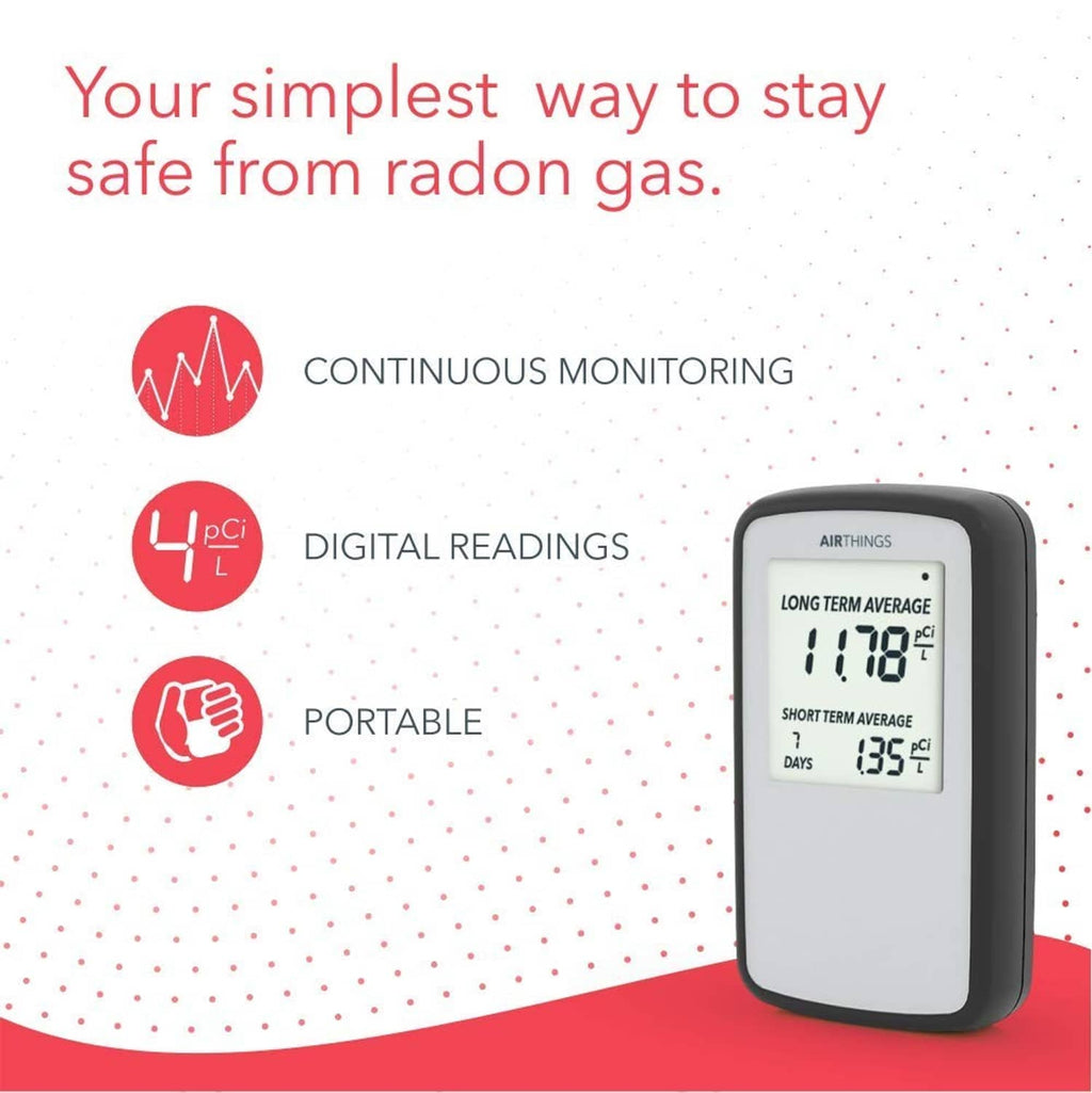 Black portable radon detector displaying long and short term radon averages