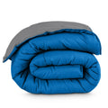 Reversible down-alternative comforter, grey and blue, rolled for Twin XL