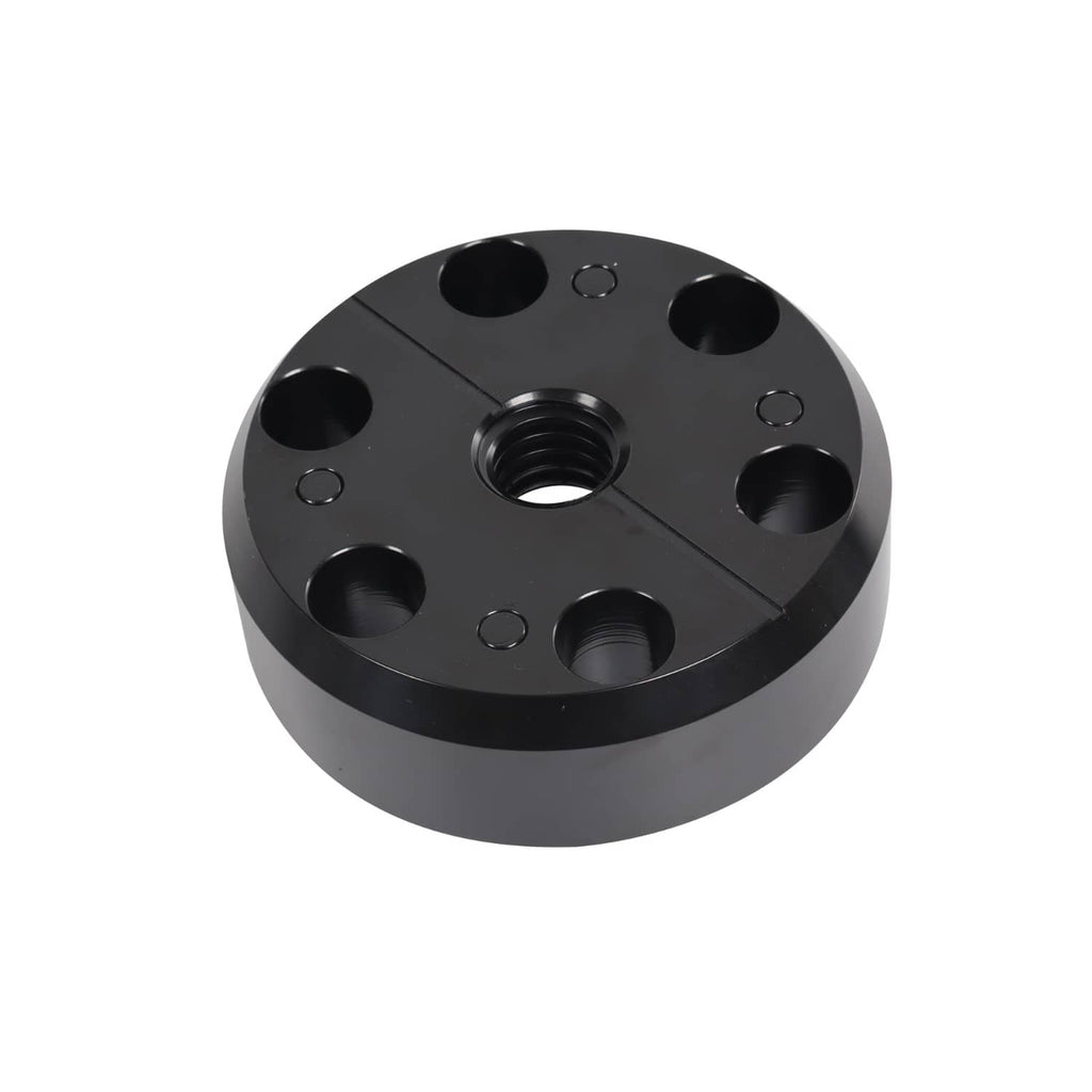 Black and silver bushing installation plate with threaded inserts and bolt holes