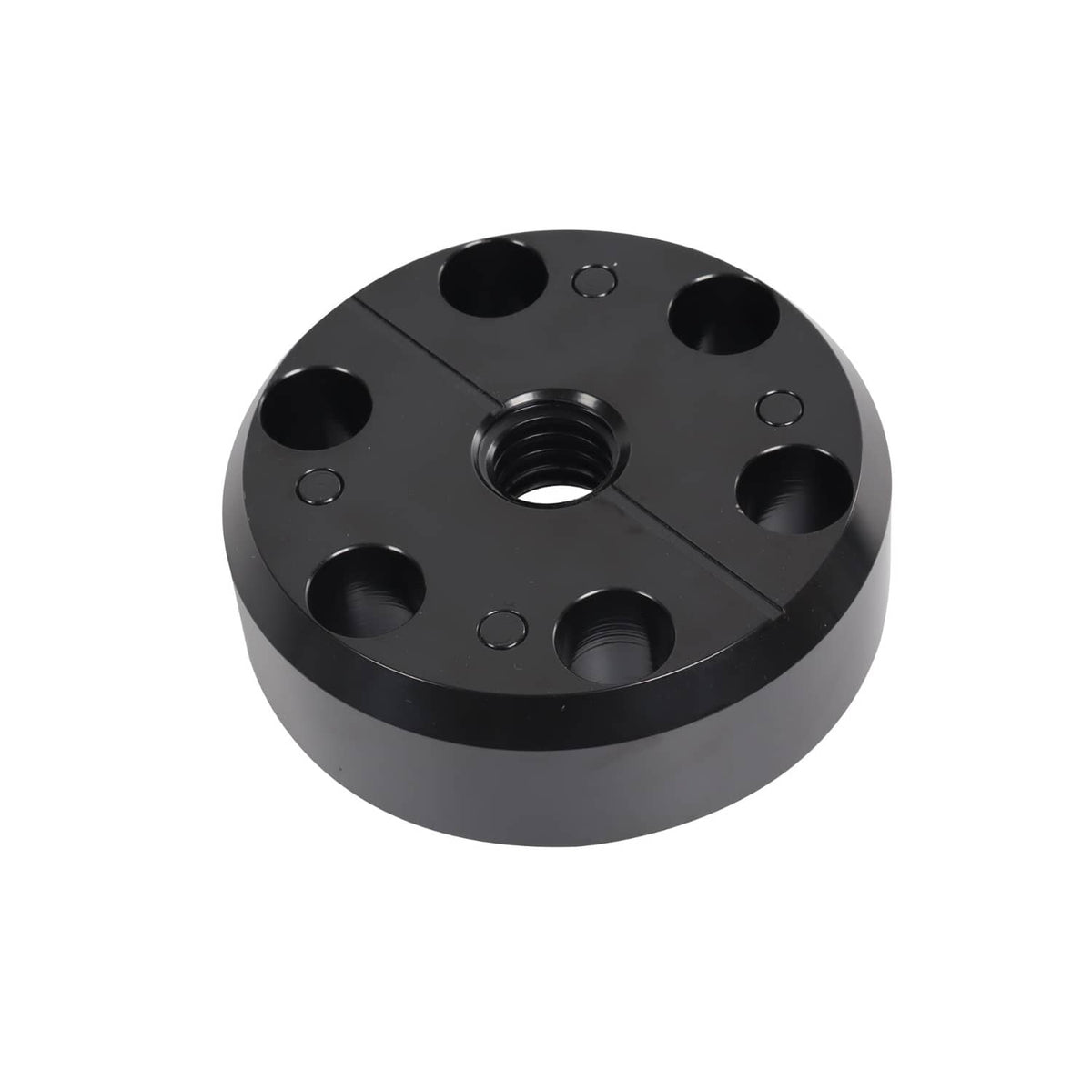 Black and silver bushing installation plate with threaded inserts and bolt holes