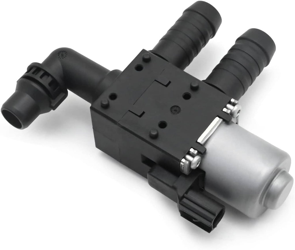 Engine heater control valve solenoid with black hoses and silver metal canister