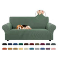 Greyish green stretch loveseat sofa slipcover with fitted arms and back