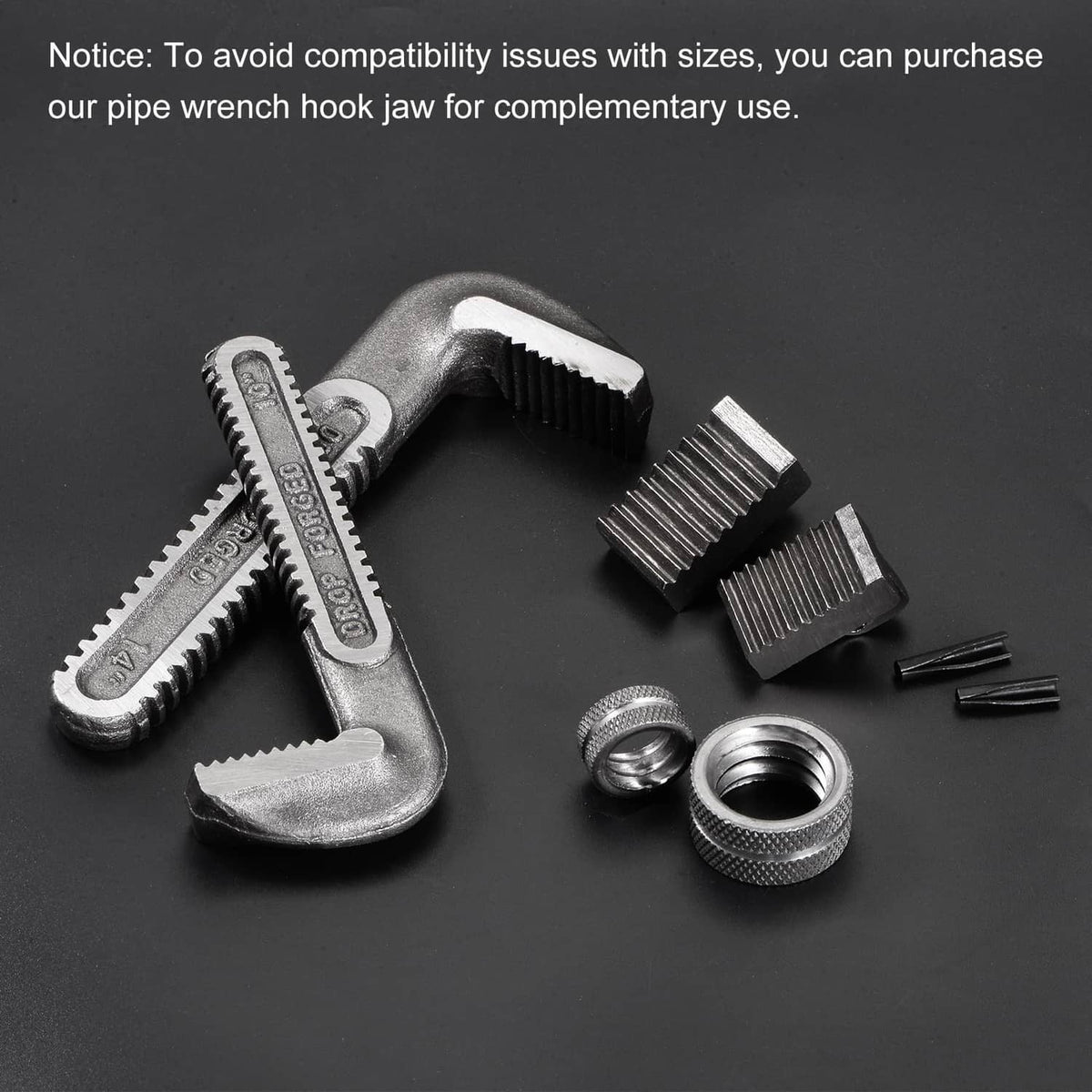 Pipe wrench jaw replacement kit with heel jaw, pin, and small metal parts