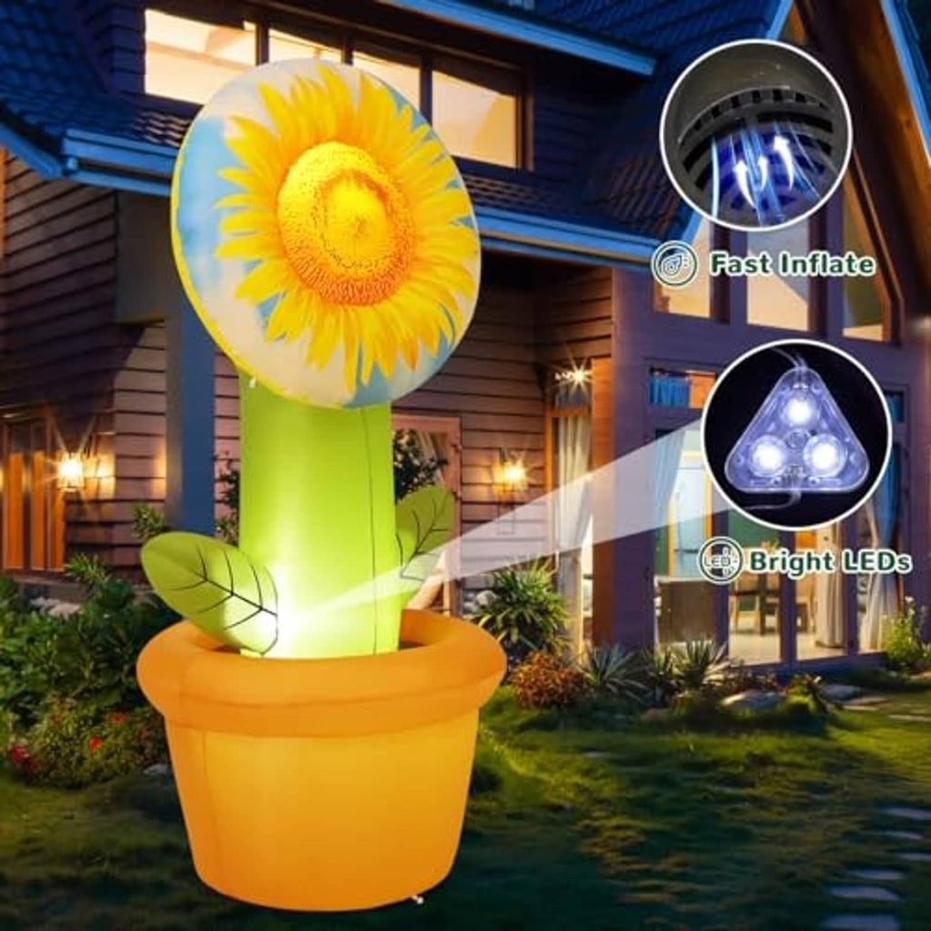 Inflatable sunflower outdoor decoration with glowing lights, yellow flower head, green stem, orange pot