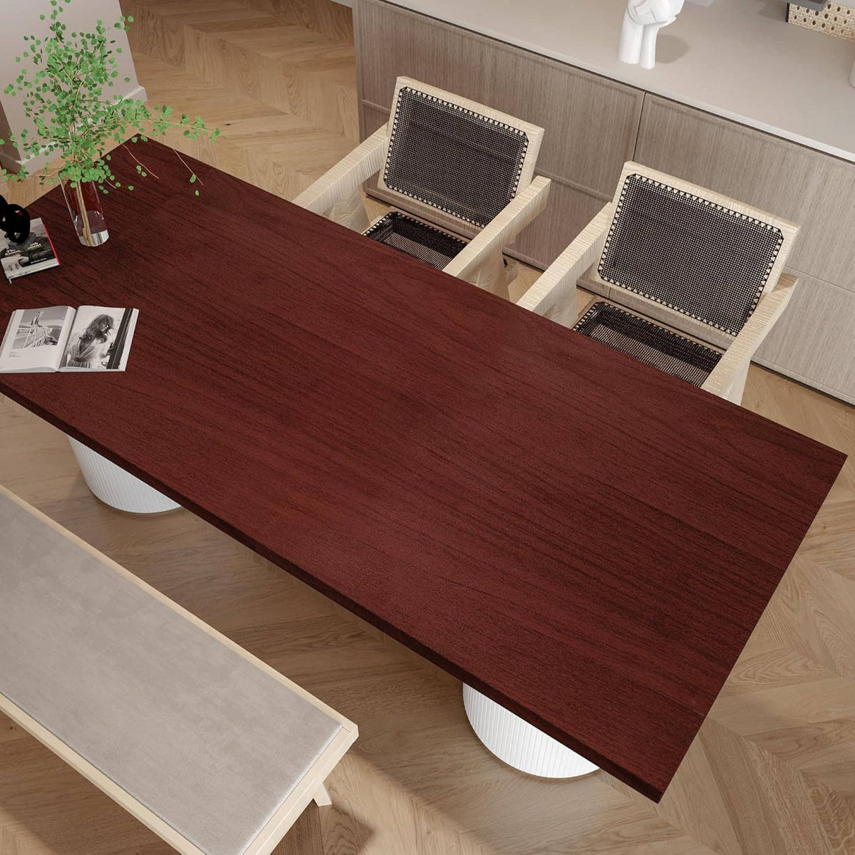 Red-brown cherry wood contact paper sheet applied to countertop, wide woodgrain plank