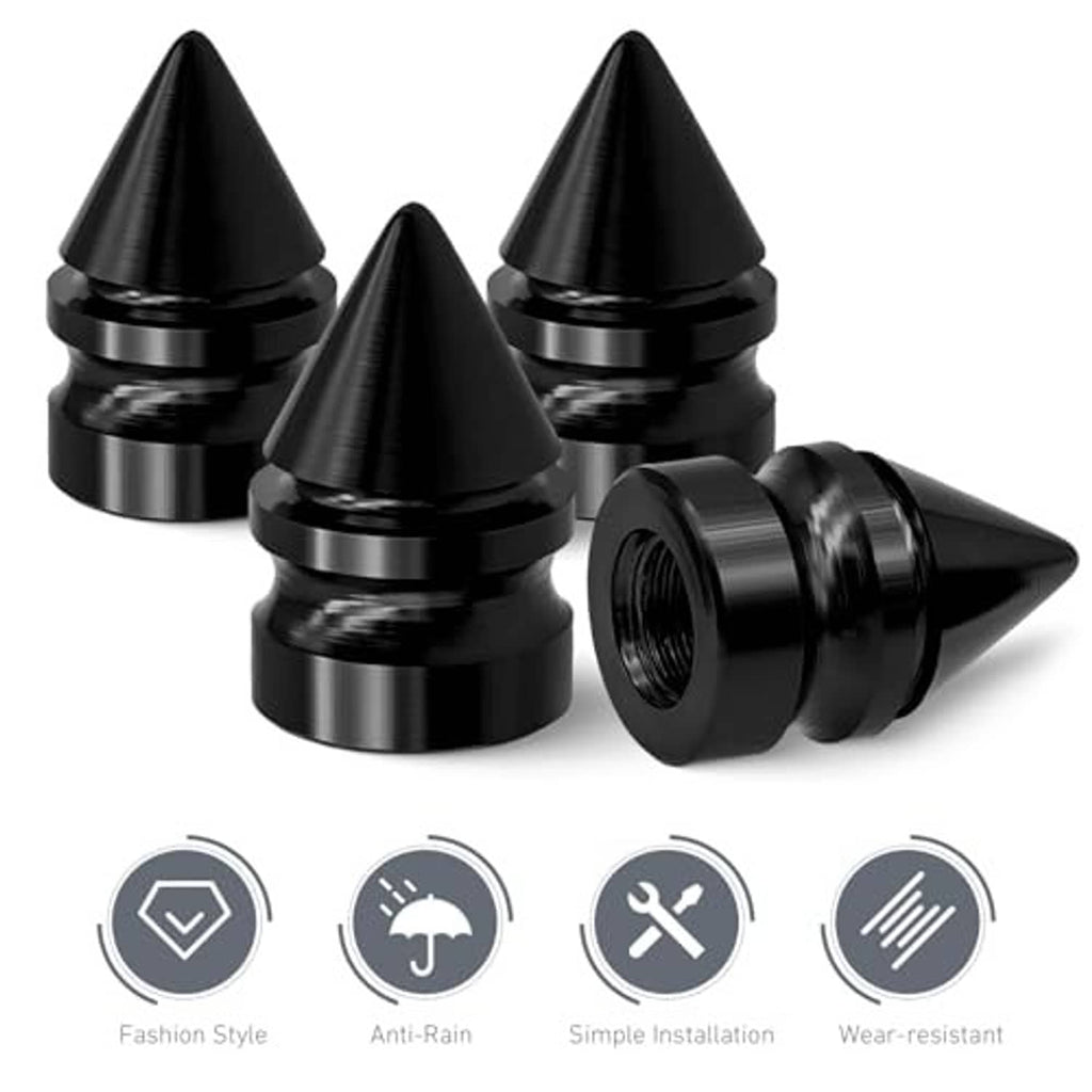 Set of 4 black spike tire valve stem caps, one shown detached