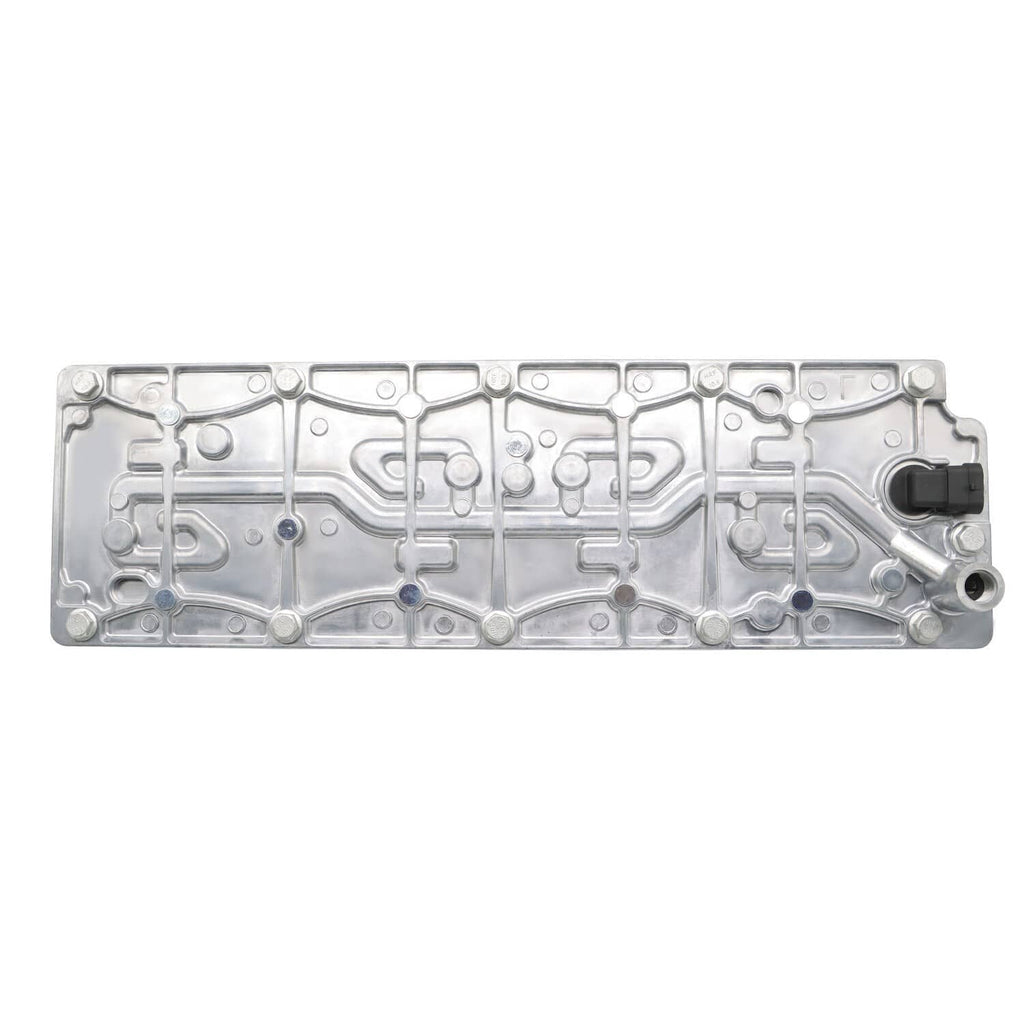 Valve cover oil manifold with molded channels and small sensor connector opening