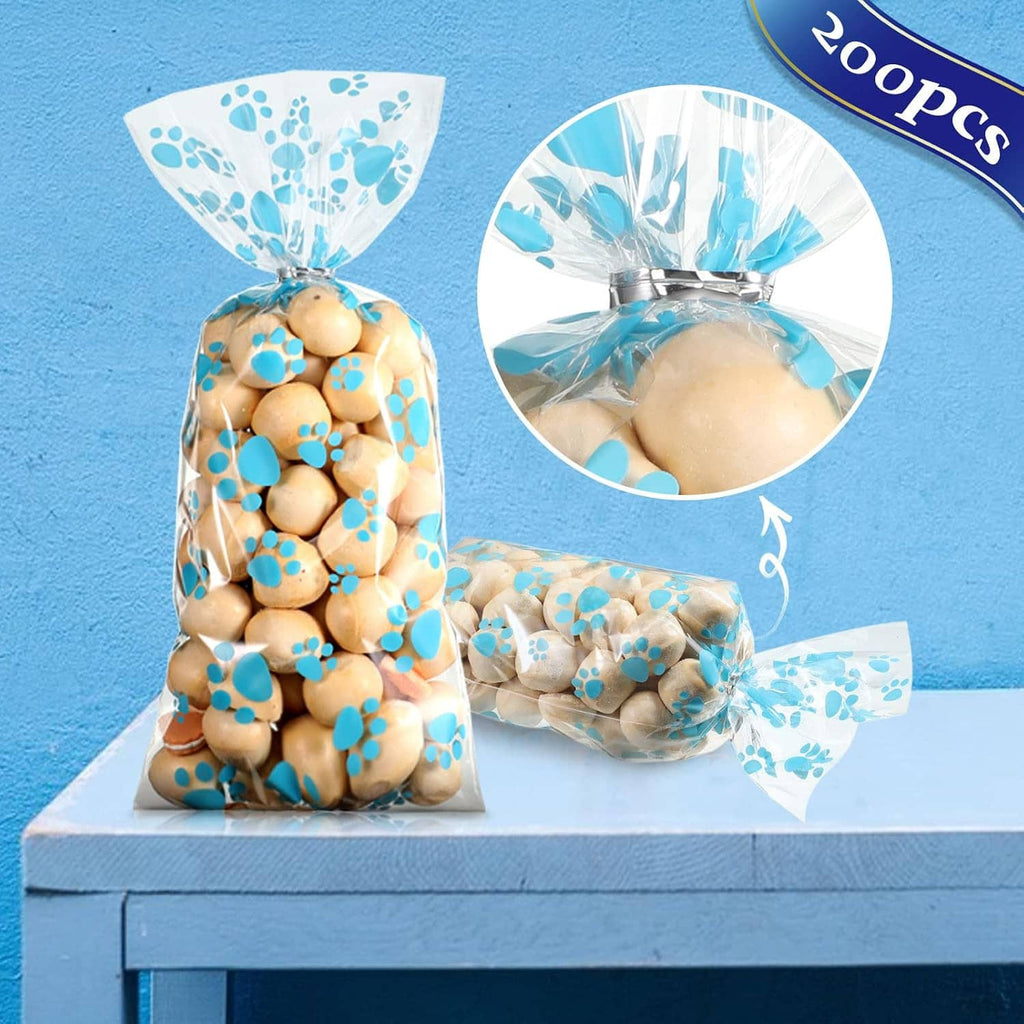 Clear blue paw print dog treat bags with draw-tied top, plus one bag showing filling area.