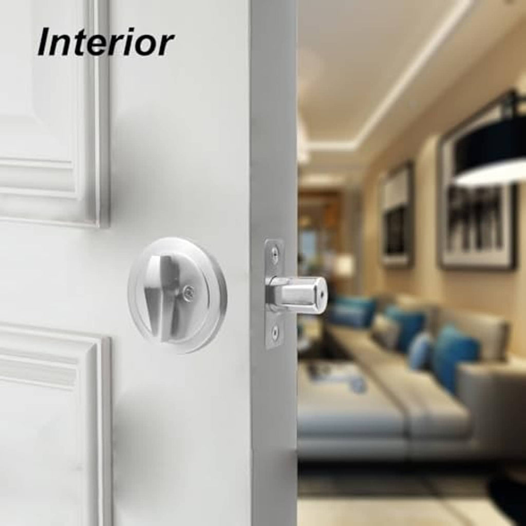 Interior side of satin nickel deadbolt lock installed on a door