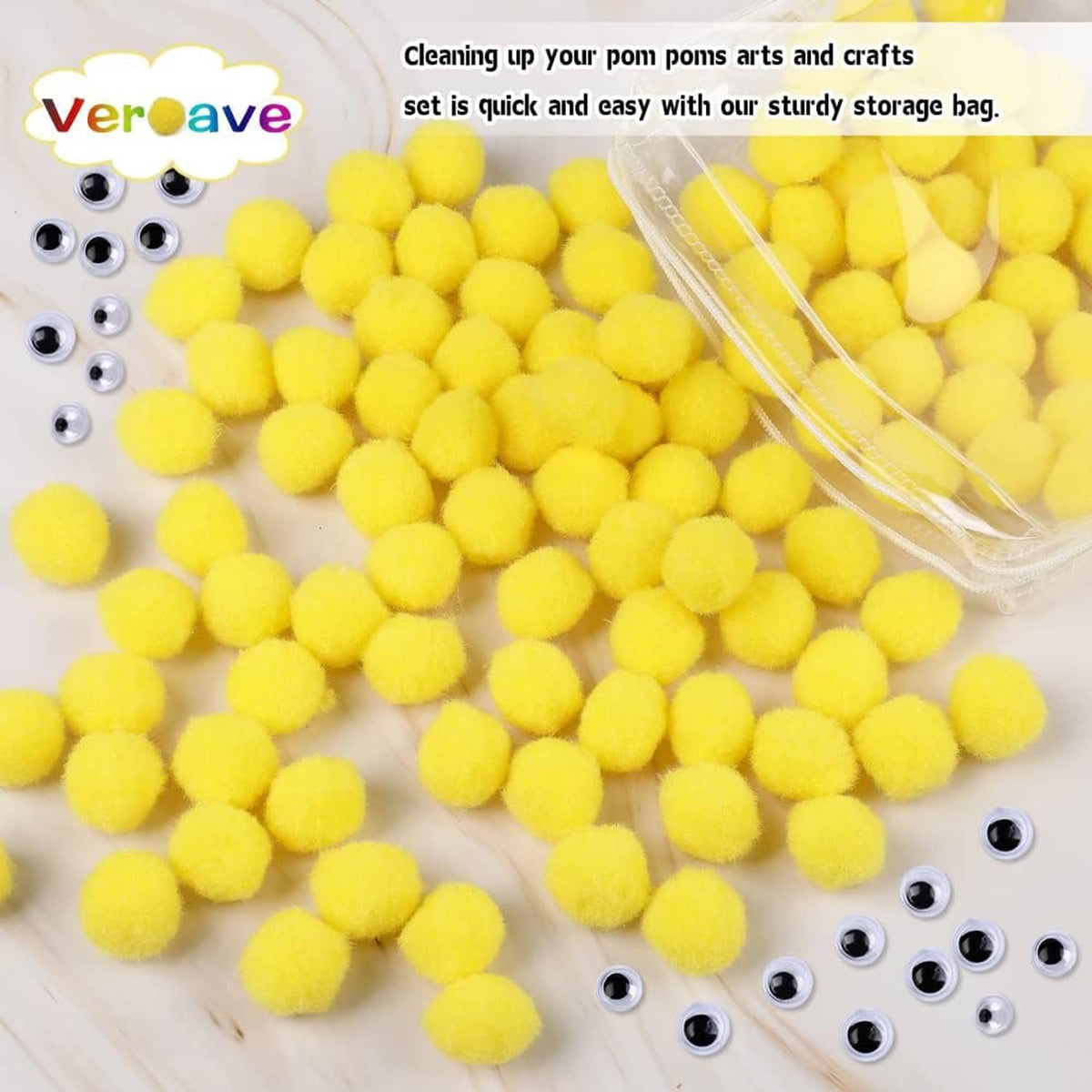 Yellow pom poms scattered across a workspace with a clear storage bag