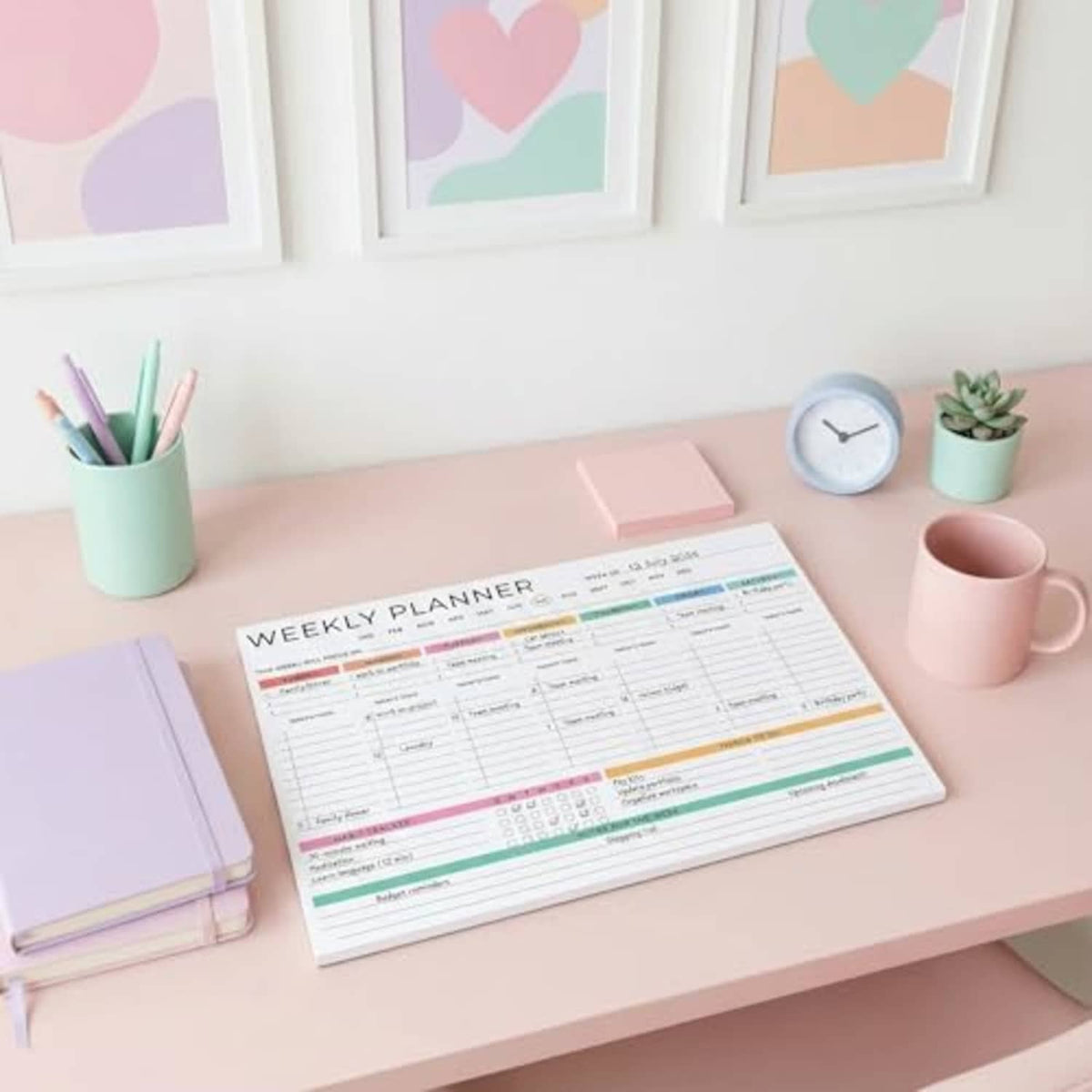Weekly planner notepad with colorful weekly schedule lines, 8.5x11 tear-off pages