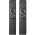 Black universal TV remote control, two units shown with navigation ring and volume keys
