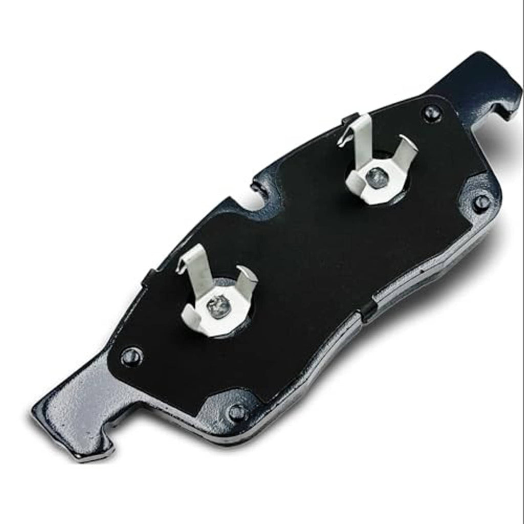 Ceramic brake pad with black backing plate, mounting holes, and clips