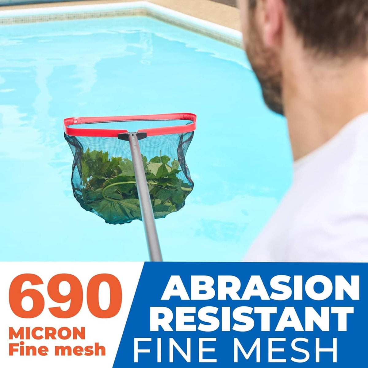 Red fine-mesh pool skimmer net collecting leaves above the water