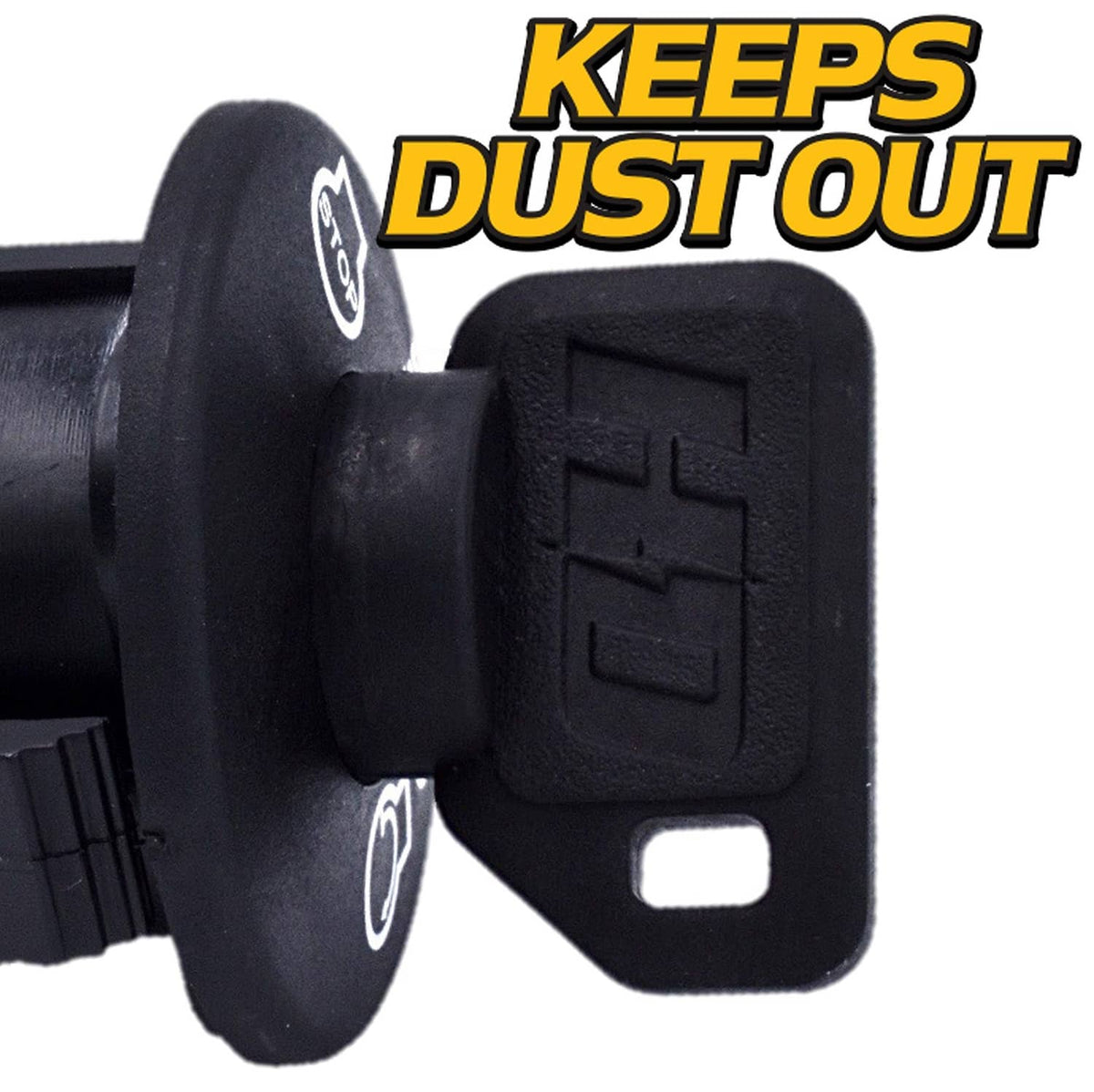 Black 4-position ignition key switch with dust cover covering the control key cylinder
