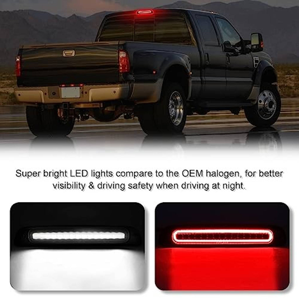 Smoked LED third brake light on a pickup truck bed, red light illuminated