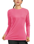 Bright pink women's long-sleeve swim shirt with crew neck, stretch fit