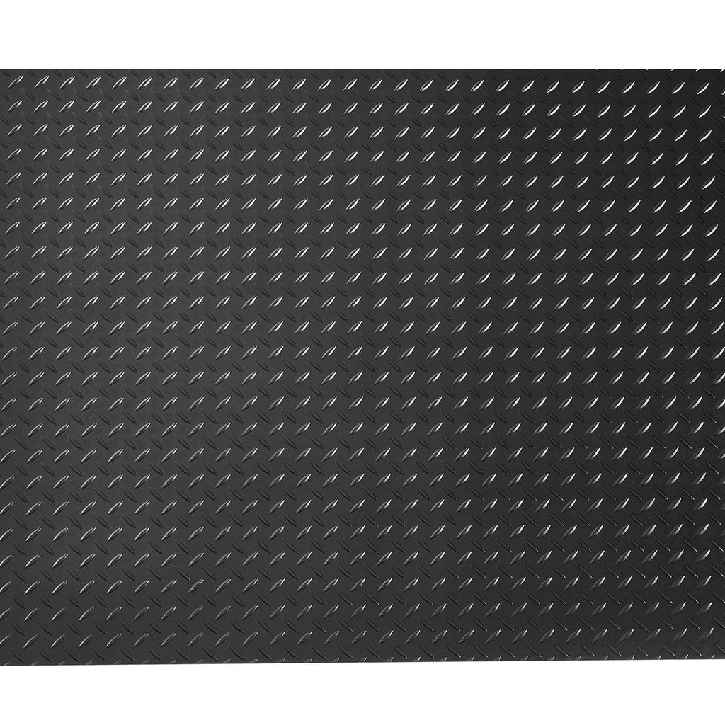 Black rubber garage floor mat close-up with raised diamond pattern texture