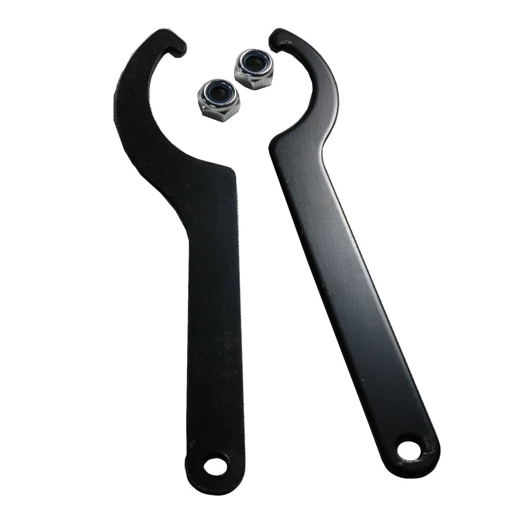 Two black adjustment wrenches with hex nuts for coilover setup, metal fasteners included