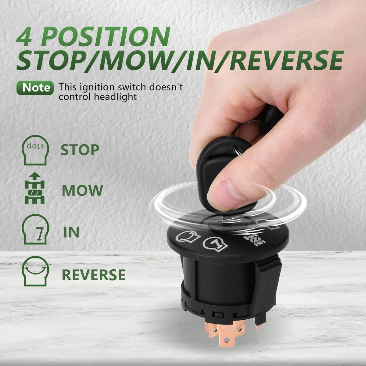 Black ignition switch with key in hand, 4-position controls