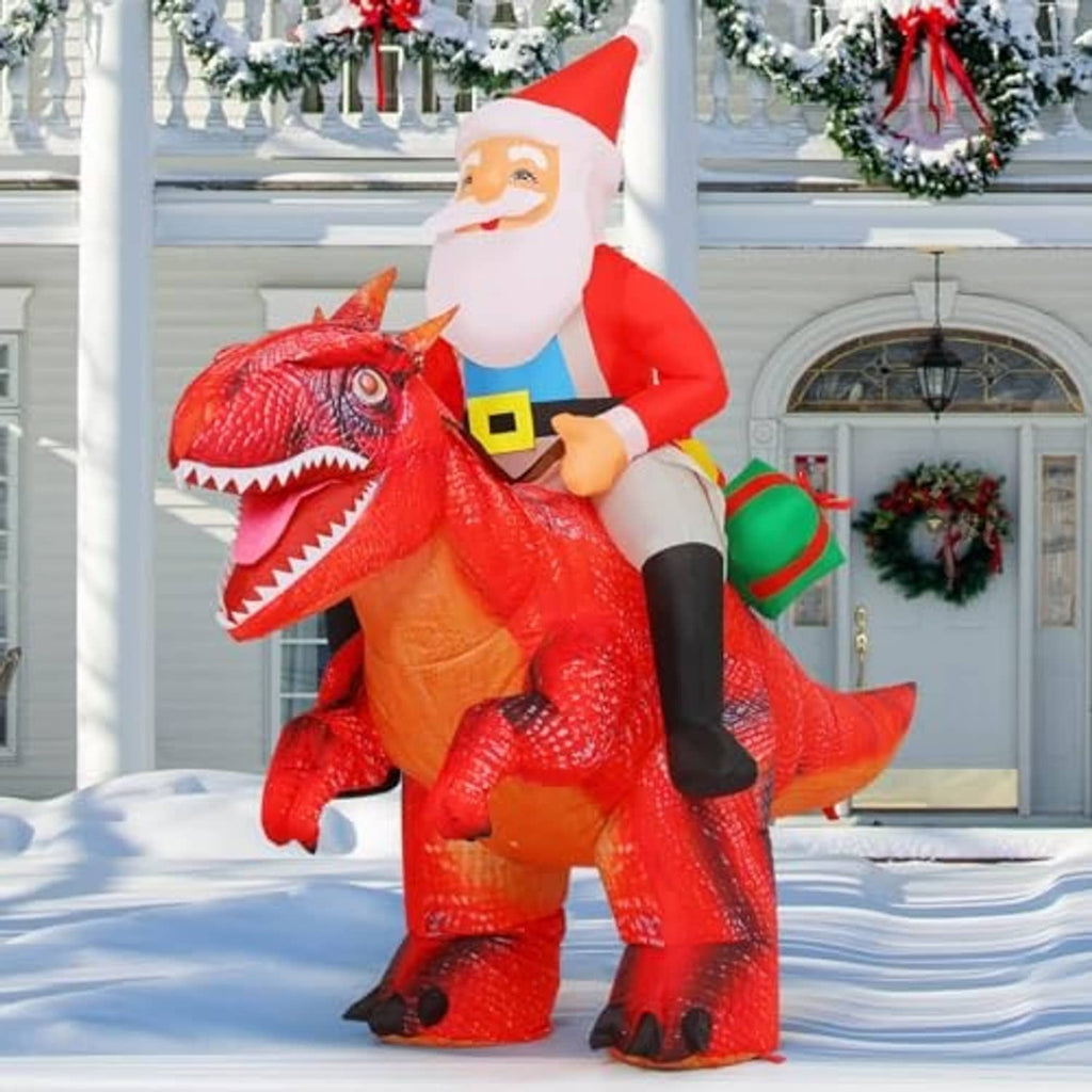 Inflatable Santa riding a red dinosaur, long tail and open mouth, red suit yard decor
