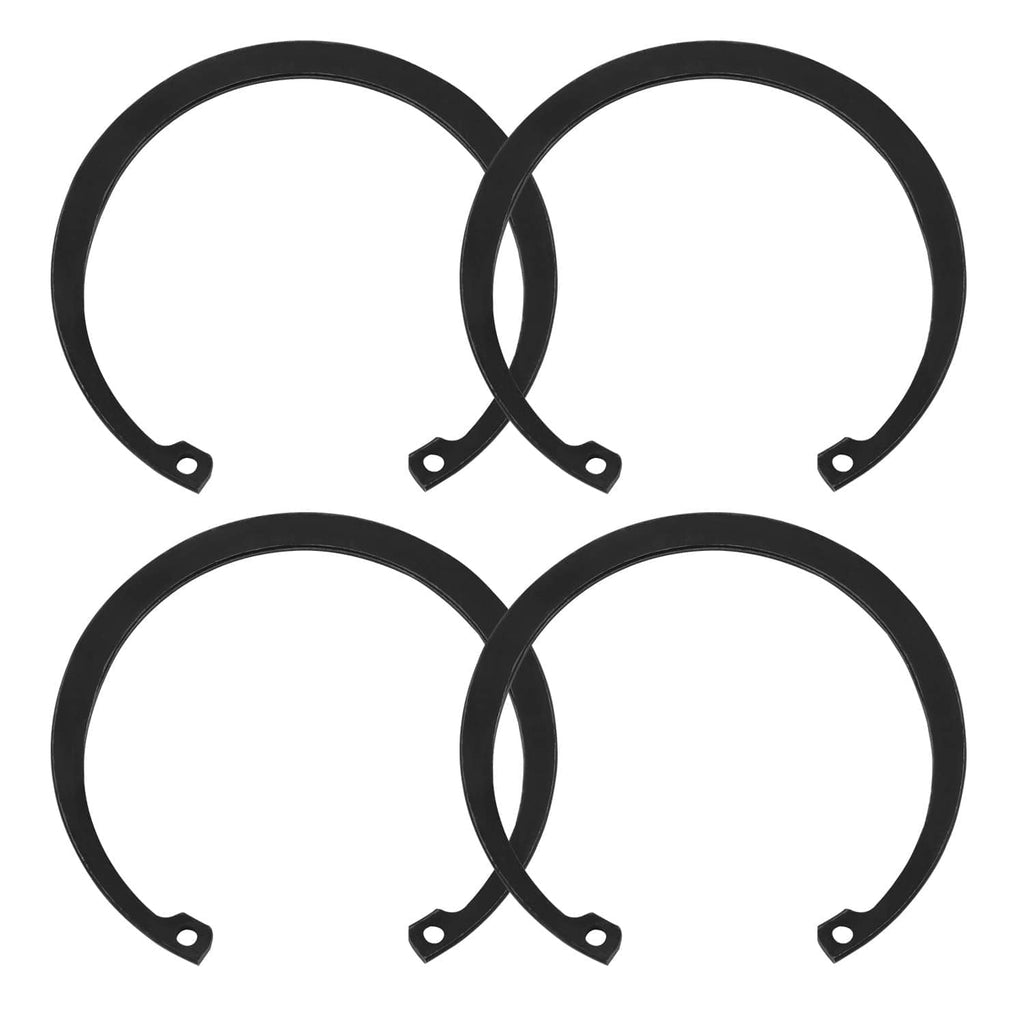 Set of four black wheel bearing retaining rings with snap tabs