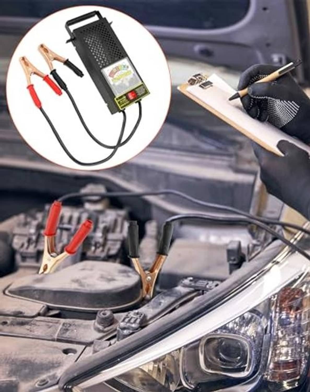 Battery load tester with test display and red/black clamp leads for vehicle use