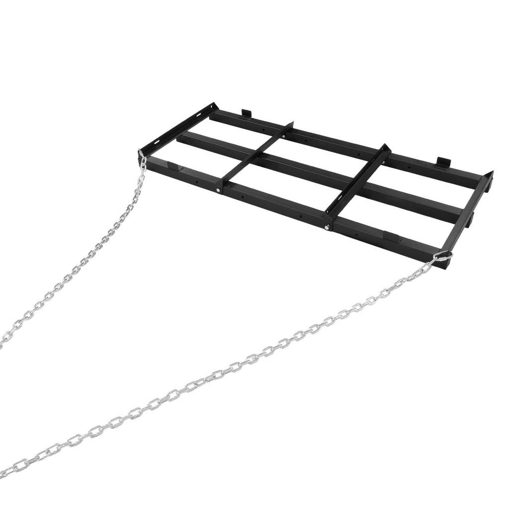 Black tow-behind drag harrow grader with silver chains on both ends