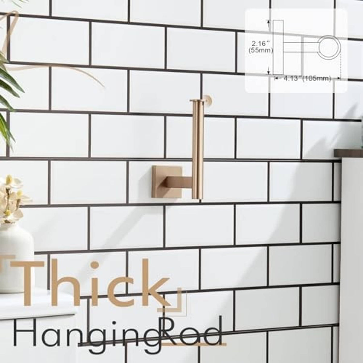 Vertical toilet paper roll holder in champagne bronze on tiled wall