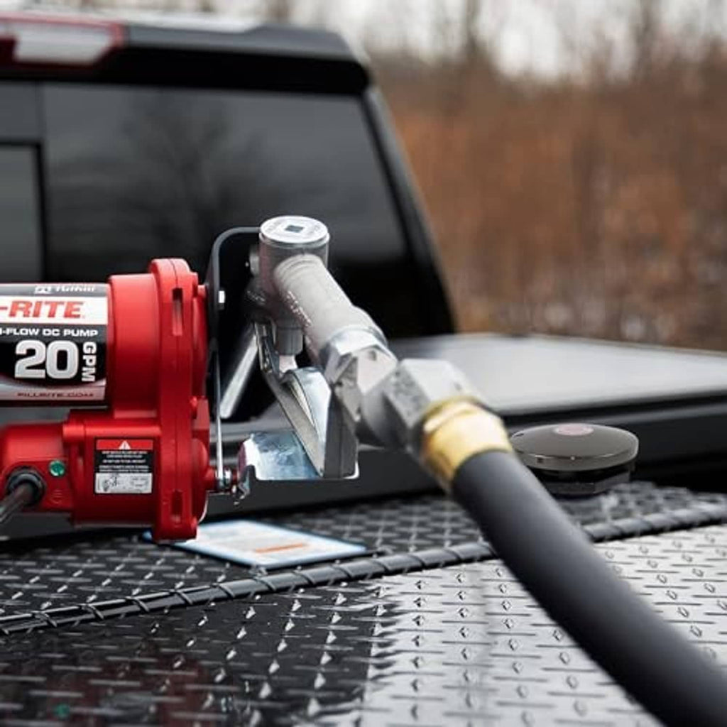 Installed vented fuel transfer cap on pickup truck bed, threaded outlet