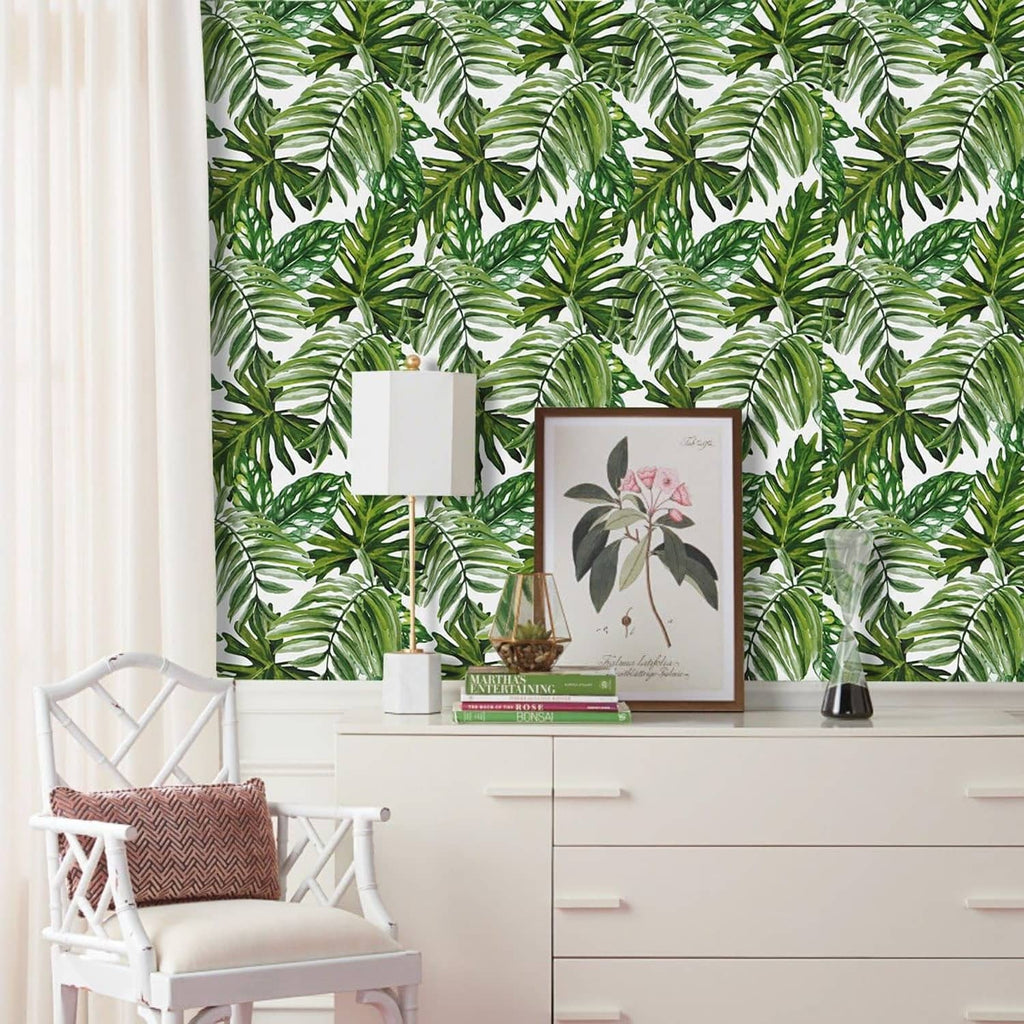 Tropical palm leaf peel-and-stick wallpaper with dense repeating green leaf motif