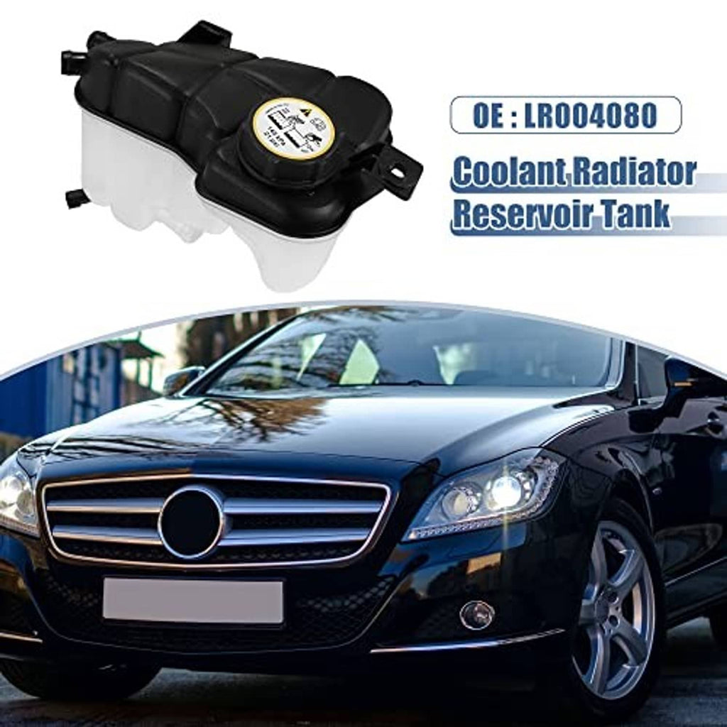 Coolant radiator reservoir tank with black top cover, yellow cap, and hose outlet port