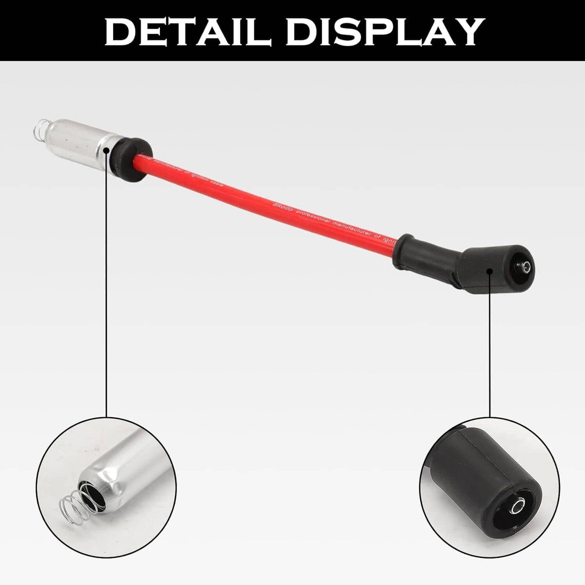 Detail of spark plug wire: red insulated cable with black ends and clear metal terminals.