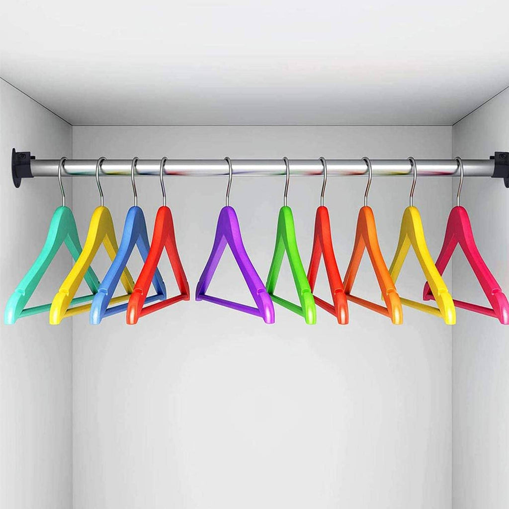 Chrome closet rod with a black end bracket supporting hanging clothes on hooks