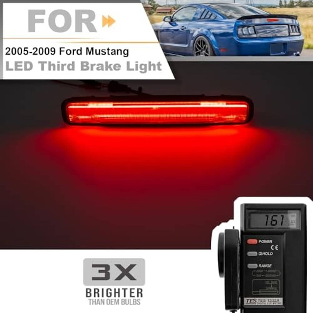 LED third brake light glowing bright red in smoked black housing