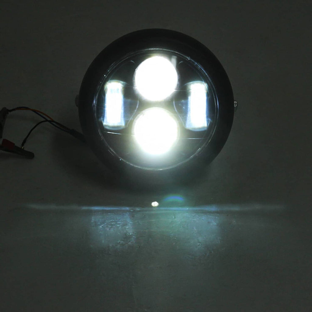 6.5-inch motorcycle headlight turned on with bright white beam