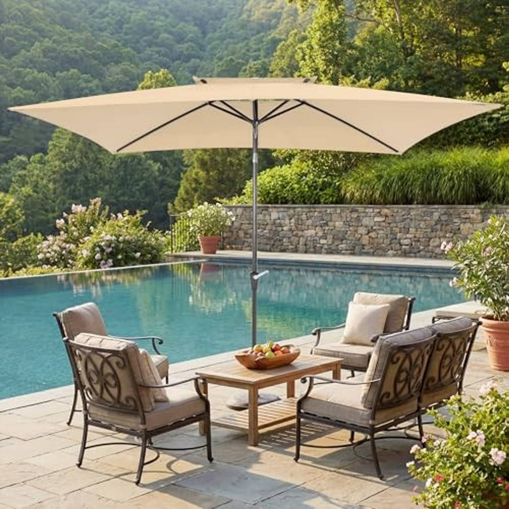Beige rectangular double-top patio umbrella centered above patio furniture