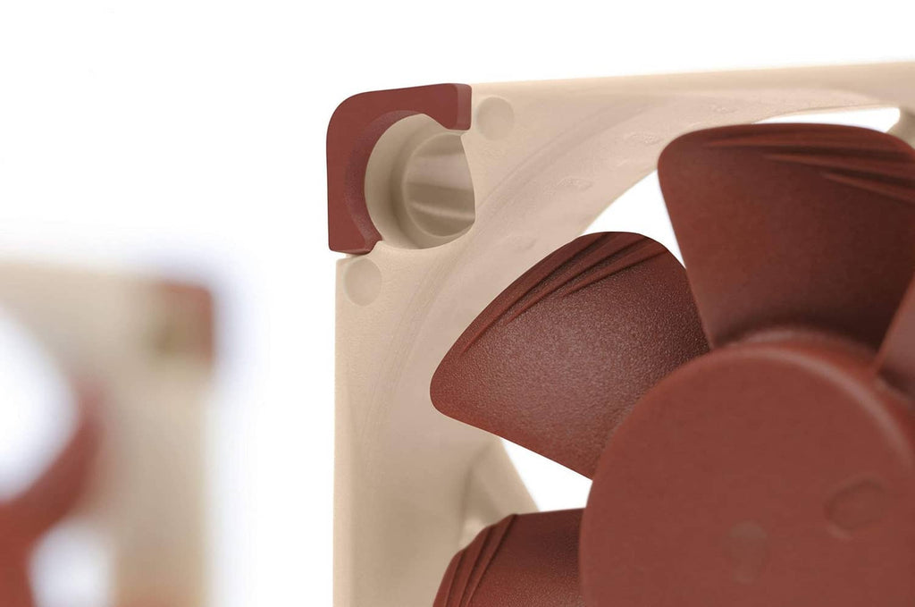 Brown fan blade close-up on cream frame with rounded mounting corners
