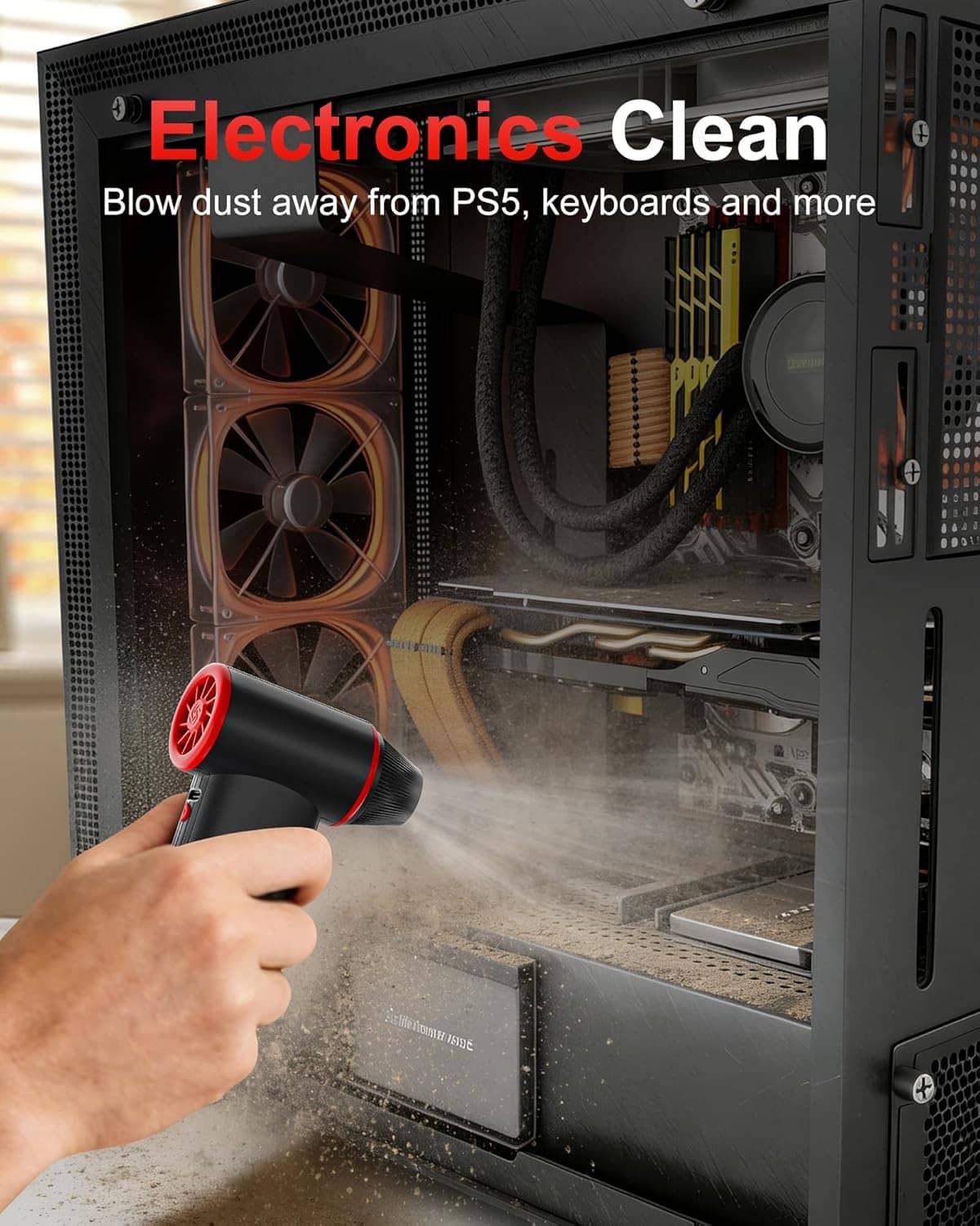Handheld air duster spraying dust from a computer vent, black with red nozzle ring