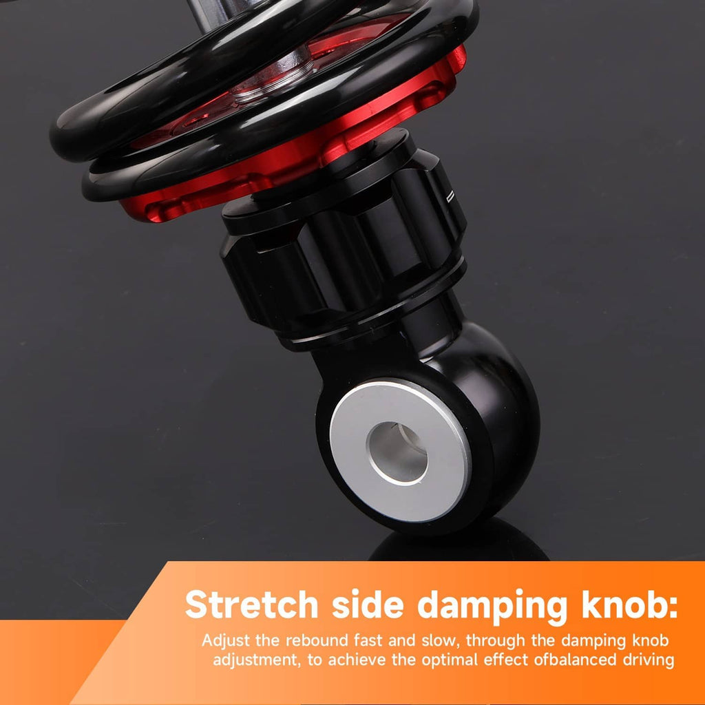 Shock absorber close-up with side damping knob, red spring coil, and black body
