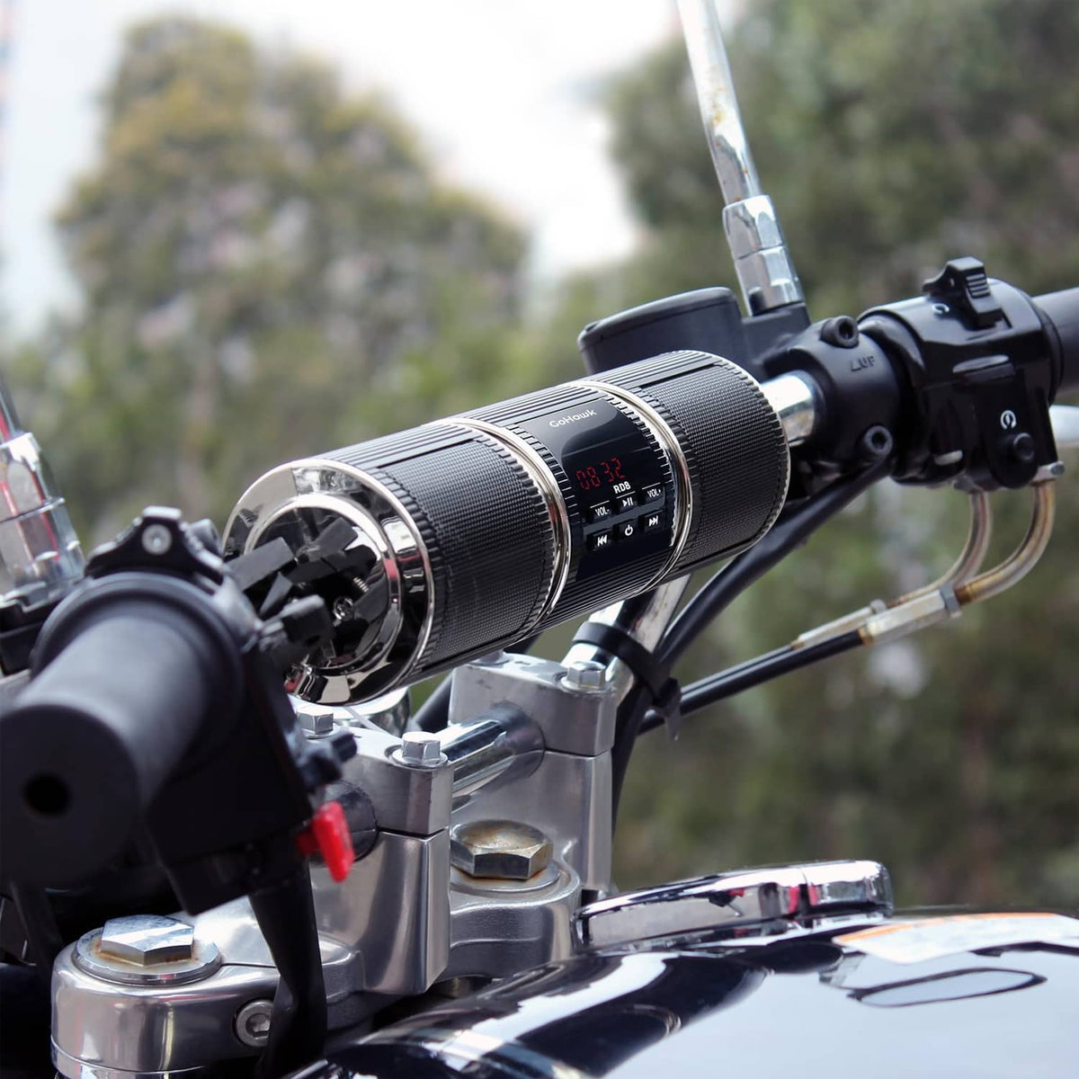 Black Bluetooth motorcycle stereo speakers mounted on handlebars with control panel