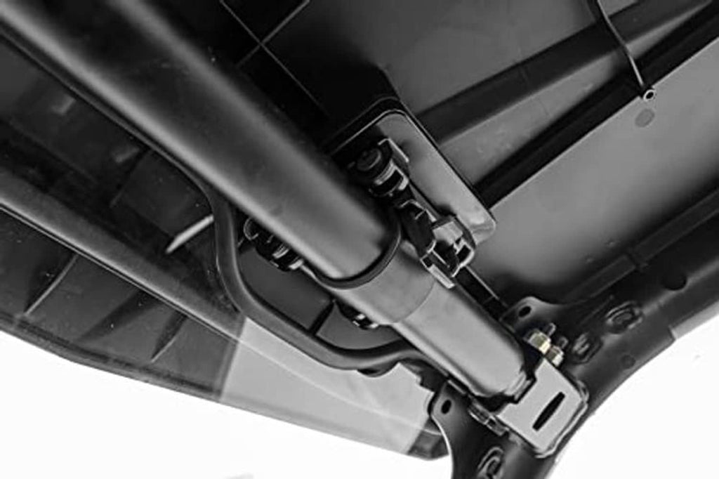 Close-up of black windshield mounting hardware and latch bracket