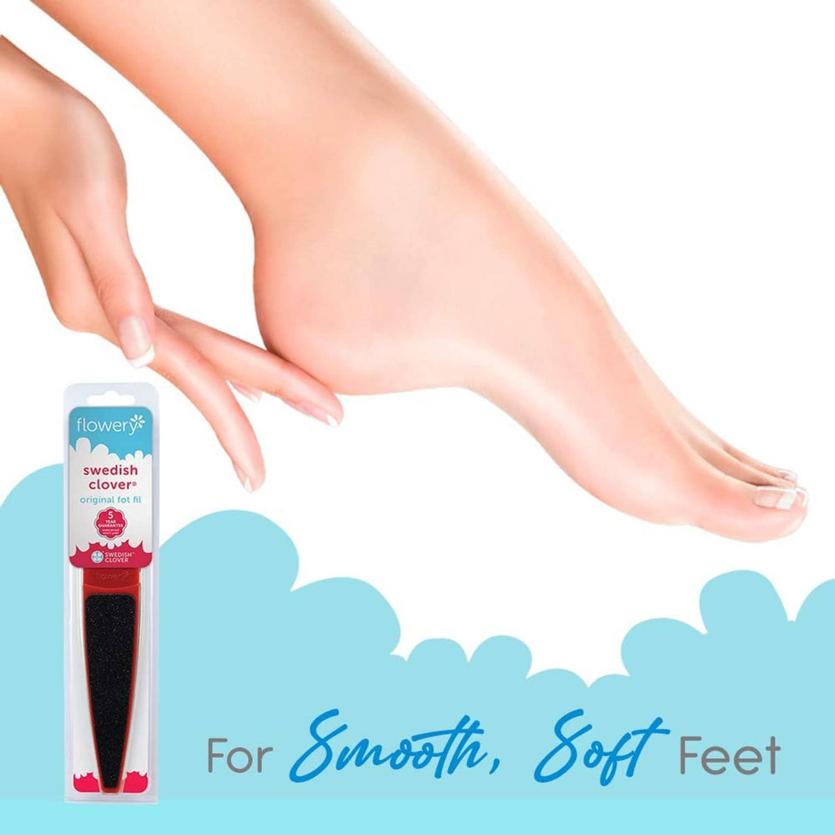 Red double-sided foot file held near bare foot for pedicure scrubbing.